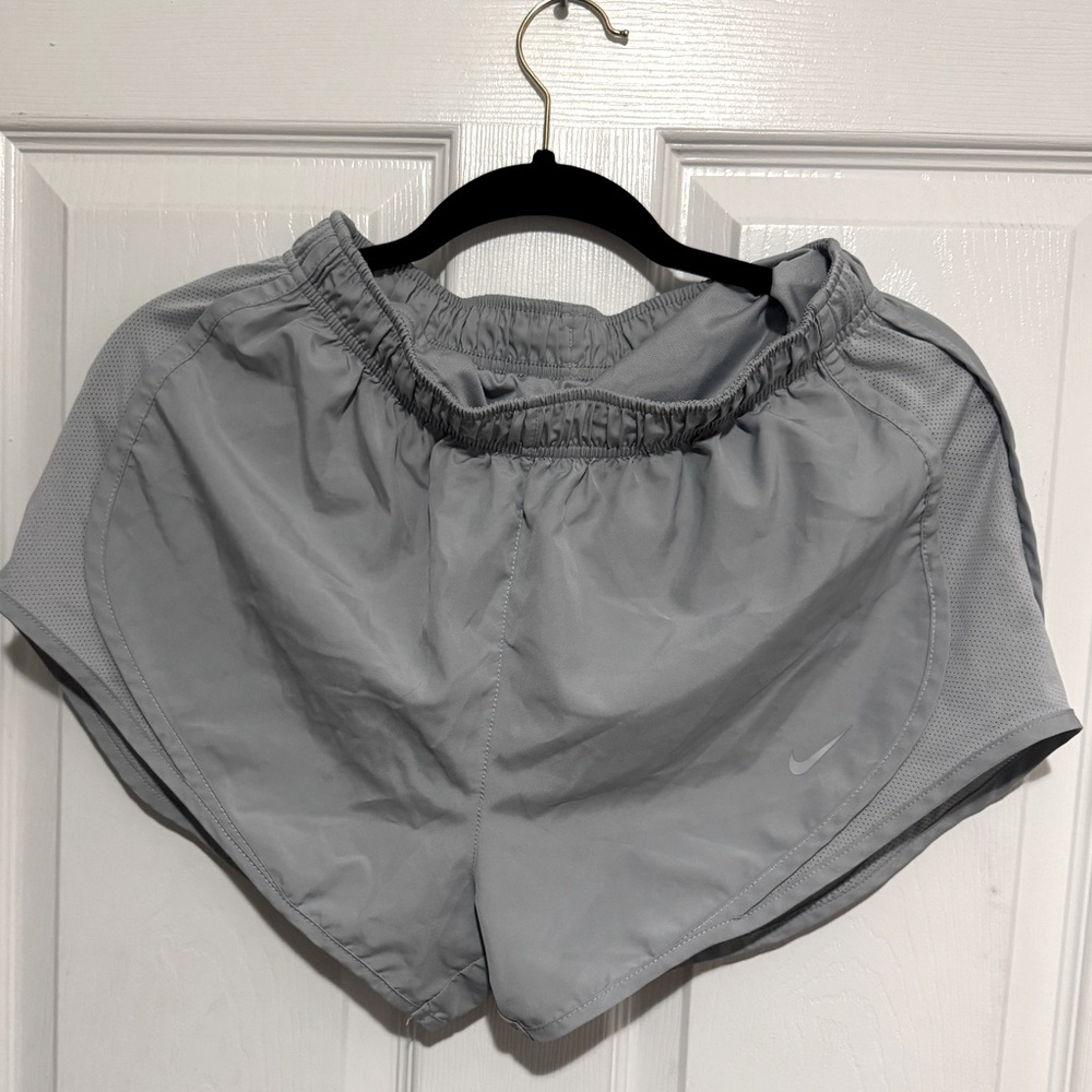 Gray/silver Nike running shorts